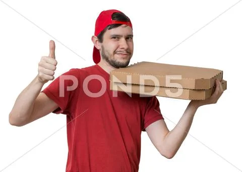 Young man is delivering pizza in boxes. Pizza delivery concept. Isolated on w Stock Photos