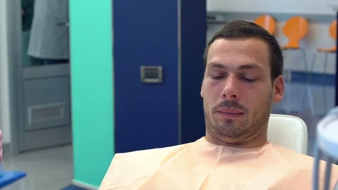 Young man at dentist Stock Footage 96107894