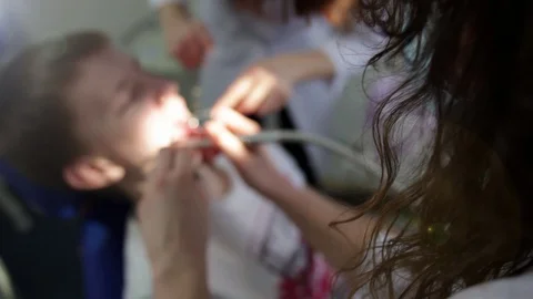 Young man in the dentist's office. Stock Footage 129741176