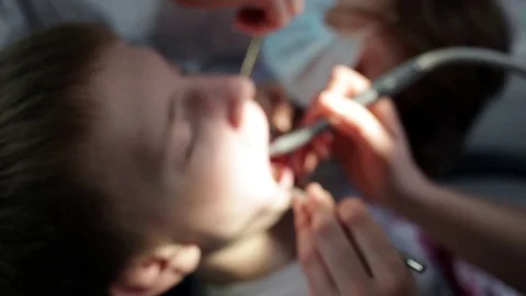 Young man in the dentist's office. Stock Footage 129744440