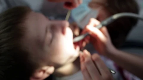 Young man in the dentist's office. Stock Footage 129744628