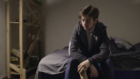Young Man in Depression Drinking Alcohol Stock Footage 84928451