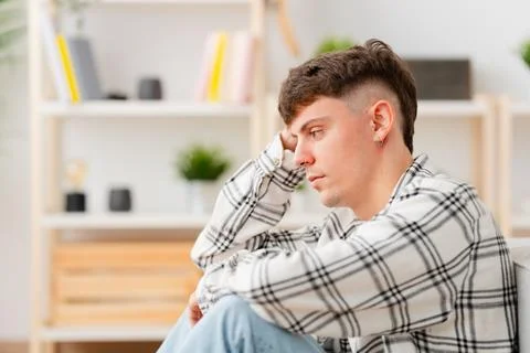 Young man with depression overthinking Stock Photos