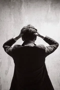 Young man in despair Stock Photos