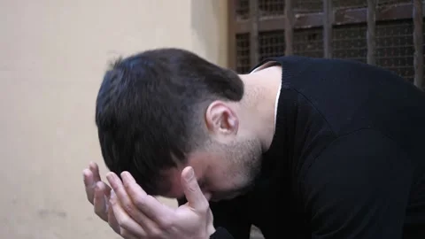 Young man in despair in urban setting Video stock 320255854