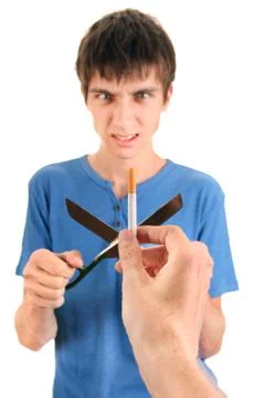 Young Man Destroy a Cigarette Foto stock