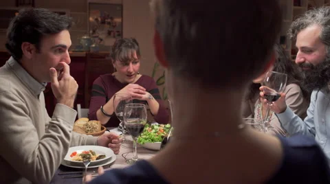 Young man dining with friends Stock Footage 46476150