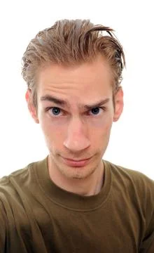 A young man with a distorted face isolated on white background Stock Photos