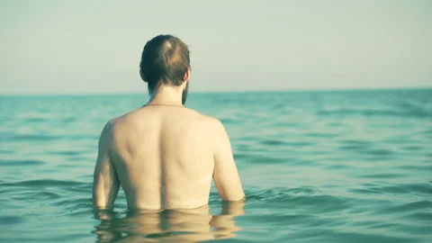 Young Man Dives into the Sea Stock Footage 132000839