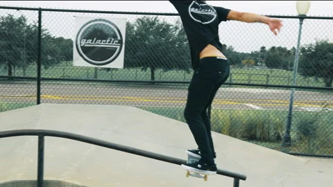 Young Man Does A Boardslide On Handrail Second Angle Video stock 161693272