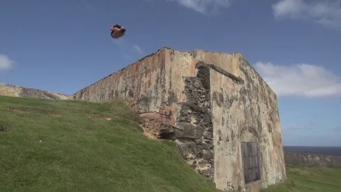 Young Man Does Gainer From Roof of Church Ruins Stock Footage 79277265