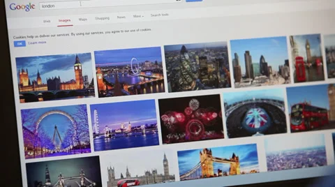 A young man does a Google image search for London 스톡 동영상 34459755