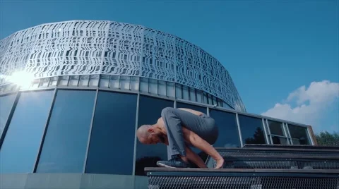 The young man does gymnastic exercises Stock Footage 66729688