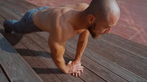 The young man does gymnastic exercises Video stock 66729747