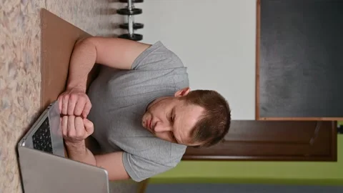Young man does plank exercise at home. New normal. Stock Footage 132793396
