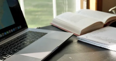Young man does schoolwork in home office. Stock Footage 141231231