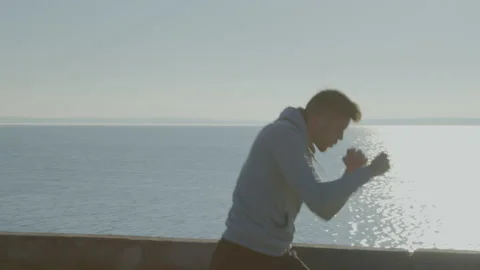 Young Man Is Doing Boxing Workout Stock Footage 165822508