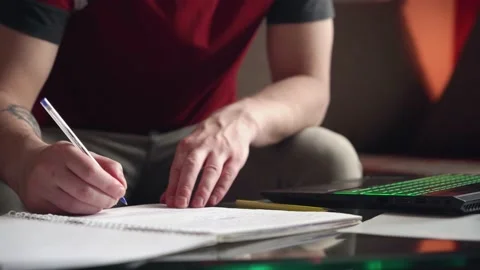 Young man is doing distance learning at home using a computer. Stock Footage 209306672