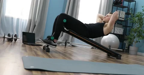 Young man doing exercise indoors at home, a body workout. Sport and fitness.  Stock-Footage 152834476