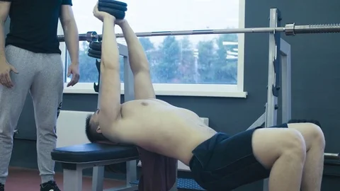 A young man doing gymnastic exercises Video stock 77590919