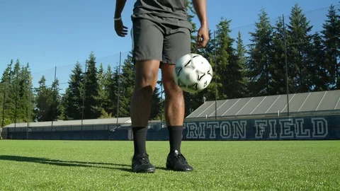 Young man doing keepie ups. Stock Footage 88048831