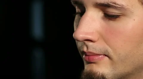 Young man doing make-up closeup Stock Footage 11012809