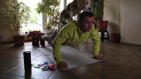 Young man doing push-ups exercises at home Stock Footage 201351222