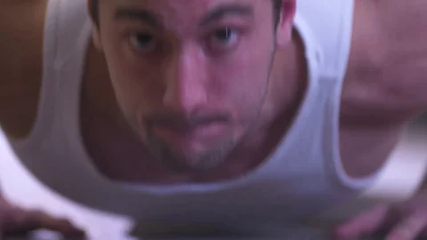 Young Man Doing Pushups in Gym Stock Footage 85310010