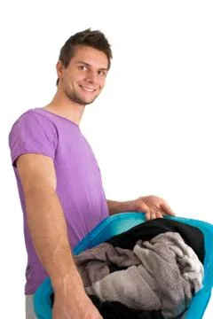Young man doing the washing Stock Photos