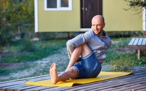 Young man doing yoga Stock Photos