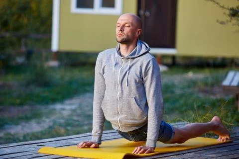Young man doing yoga Stock Photos