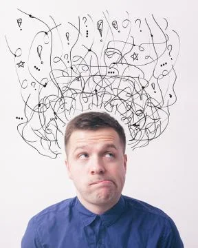 Young man in doubt looking forward, his mouth open in surprise with drawn sig Stock Photos