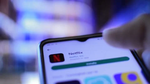 young man download netflix streaming Stock Video Pond5