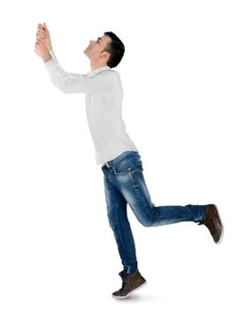 Young man drag something Photos