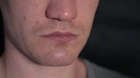 The young man drank one pill and washed it down with water. close-up Video stock 128451036
