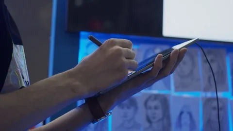 Young man drawing portrait using tablet Stock Footage 122519691