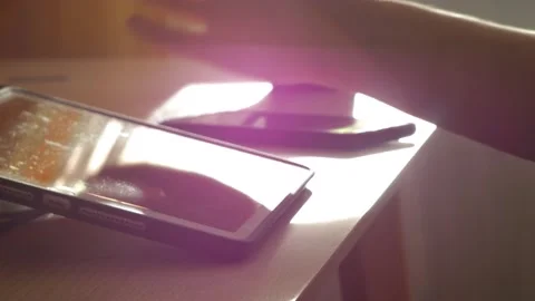 A young man draws with a pen on a tablet pc Stock Footage 220337506