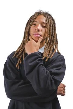 Young man with dreadlocks thinking, contemplating ideas Stock Photos