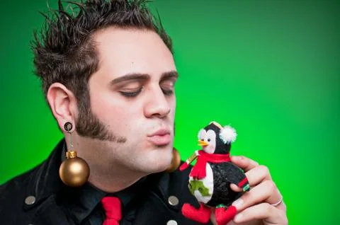 Young man dressed as a christmas loving emo goth Stock Photos
