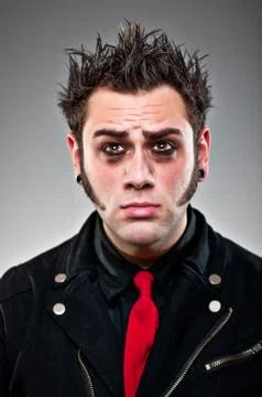 Young man dressed as an emo goth. Stock Photos