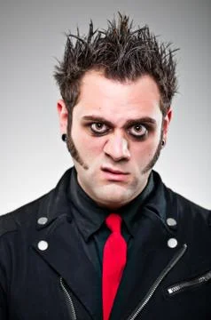 Young man dressed as an emo goth. Stock Photos