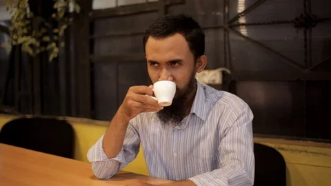 Young Man Drink a Coffee Stock Footage 107599634
