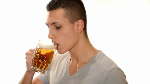 Young man drinking a beer  Video stock 33364737