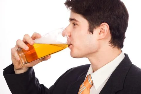 Young man drinking beer Stock Photos