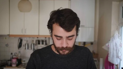 Young Man Drinking Coffee And Smiling Stock Footage 119217116
