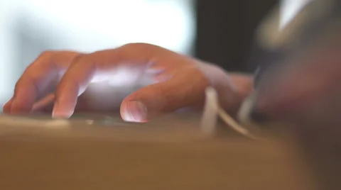 Young man drinking coffee in cafe and looking at the phone screen Stock Footage