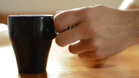 Young man drinking a coffee mug in the morning. 스톡 동영상 219467379