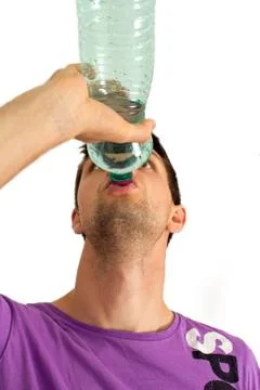 Young man drinking Stock Photos
