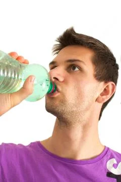 Young man drinking Stock Photos