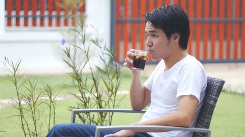 Young man drinking water Stock Footage 71759680